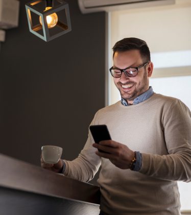 Man surfing the Internet using smart phone